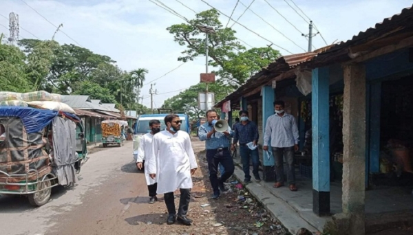 টিকা গ্রহণে উদ্বুদ্ধ করে নেত্রকোনা যুবলীগের প্রচারণা